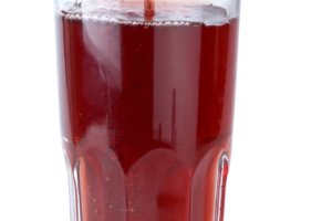 Glass poured with pomegranate juice